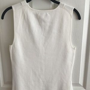 White sleeveless top